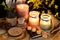 Esoteric and occult still life with vintage magic objects, runes and burning candles on witch table altar for mystic rituals and