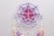 Esoteric woven mandala magical dreamcatcher  on grey background