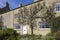 Espalier pear tree growing on Cotswold House, Blockley