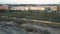 Espinho, Portugal - 12.10.2023: Drone view of a beautiful sandy beach large stones, wooden bridges and paths, railway