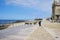 Esposende, PORTUGAL - April 22: Senior drives a bike on promenade along the Apulia beach