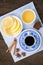 Espresso in blue cup with lemon and honey on the table