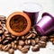 Espresso coffee capsules or pods and coffee beans on grey background