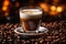 espresso in glass with coffee beans on dark background stock photo