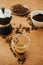 Espresso in glass cup, roasted coffee beans, grounded coffee, geyser maker - alternative coffee brewing method. Coffee maker,