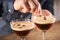 Espresso martini vodka short drink as a coffee cocktail inclduing coffee liqueur and vanilla syrup