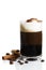 Espresso with milk froth cocoa powder and cinnamon