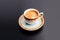 Espresso vintage cups on a black background. Generative ai