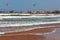 ESSAOUIRA, MOROCCO - JUNE 10, 2017: Kiteboarding activities on the Atlantic ocean waves in the Essaouira