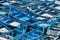 Essaouira, Morocco - March 16, 2018: A multitude of blue fishing boats typical of the city stuck together