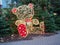 Essen, Germany: November 28, 2021 - A lighted teddy bear surrounded by Christmas trees in the city center. Christmas decoration