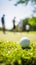 Essence of Golfing on a Dreamy Day with a Ball in the Foreground against a Sunlit Horizon