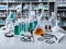 Essence of laboratory safety. Lab goggles, lab coats, and gloves arranged neatly on a laboratory bench. AI Generated