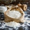 Essential baking ingredient paper bag filled with fresh flour