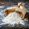 Essential baking ingredient paper bag filled with fresh flour