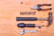 Essential basic tools set consisting hammer, plier, screwdriver,