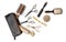 Essential hair dresser tools with leather bag on white background