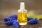 Essential oil of muscari flower on a table in beautiful bottle