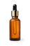 Essential serum oil in amber dropper bottle with gold cap