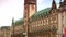 Establishing shot of the Hamburg town hall and market place.