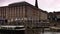 Establishing shot of the Hamburg town hall and market place.