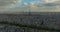 Establishing shot of Paris, France. Aerial drone distant sunset view of Tour Eiffel Tower and Seine River bridge traffic