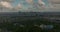 Establishing shot of Paris, France. Aerial drone distant sunset view of Tour Eiffel Tower and Seine River bridge traffic