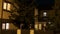 Establishing shot of smart residential house with lights turning on and off on first and second floor -