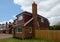 Estate of New builds, empty, detached family house.