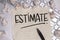 Estimate, text words typography written on paper against computer keyboard, life and business motivational inspirational