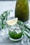 Estragon lemonade. Concept refreshing summer drinks. Fresh cool lemonade tarragon with ice and citrus slices.