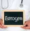 Estrogen, doctor holding chalkboard with text