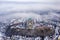 Esztergom, Hungary - Aerial view of the beautiful snowy Basilica of Esztergom on a foggy winter