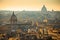 Eternal city of Rome rooftops and towers golden sunset view