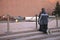 The Eternal flame near Kremlin wall in the Alexander garden. The young man knelt down as a sign of respect and memory of the sold