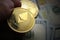 ETH Ether Ethereum Golden Cryptocurrency Coin. Closeup