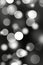 Ethereal abstract grey light bokeh defocused background perfect for artistic designs