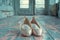 Ethereal Ballet Pointe Shoes Abandoned in a Dance Studio The satin blurs with the wood