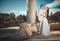 Ethereal, divine bride with shiny dress and groom standing near