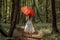 Ethereal Forest Charm: Graceful Woman Experiences Tranquility with a White Summer Dress and Red Sunshade, ai generative