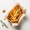 Ethereal French Fries With Explosive Pigmentation On White Table