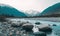 Ethereal River Flowing Through Stones Near Mountains for a Serene Background.