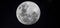 Ethereal scene of a full moon in the night sky