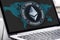 Ethereum currency sign on laptop screen