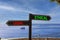 Ethical or legal symbol. Concept word Ethical or Legal on beautiful signpost with two arrows. Beautiful blue sea sky with clouds