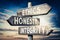 Ethics, honesty, integrity - wooden signpost, roadsign with three arrows