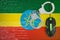 Ethiopia flag and handcuffed computer mouse. Combating computer crime, hackers and piracy