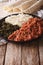Ethiopian cuisine: kitfo with herbs and cheese. Vertical