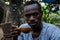 Ethiopian man drinking coffee