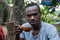 Ethiopian man drinking coffee